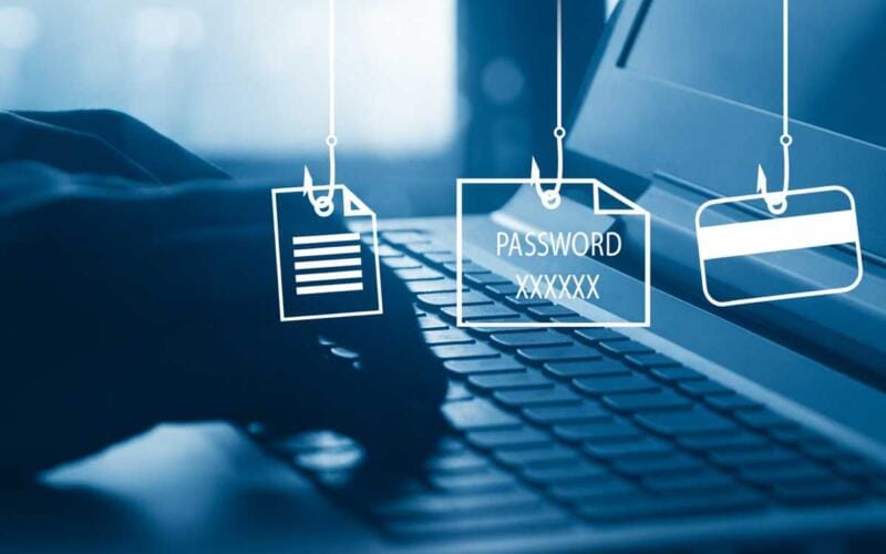 Attacco di phishing social con furto di password e dati personali tramite e-mail e documenti falsi su computer portatile.